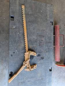 Vintage Long Serrated Blade Saw with Spring-Loaded Clamp