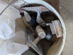 2 Buckets of Mixed Concrete Finishing Tools