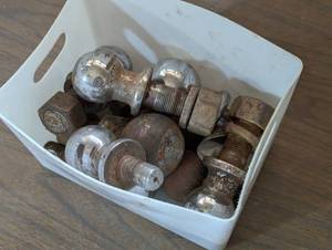 Bin of assorted Hitch Balls and pins - All sizes