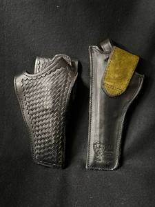 lot 36 image: Smith & Wesson Leather Gun Holsters (Lot of 2)