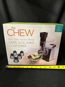 lot 44 image: The CHEW 5-in-1 Prep Express Shooter Vegetable Shredder