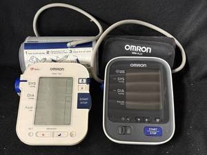 lot 69 image: Omron Blood Pressure Monitor - 2 Units with Cuffs