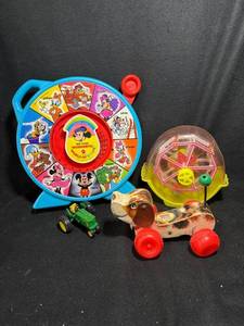 lot 152 image: Fisher Price Little Snoopy, Mattel See ,N Say, Marlin Toys Ferris Wheel, Green Tractor  - 4-Piece Vintage Kids Toys