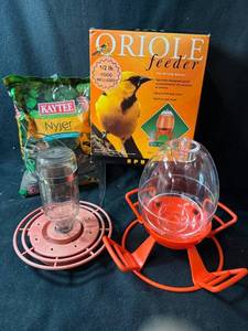 lot 176 image: Oriole Feeders (Lot of 2) - 2 Bird Feeders with Glass Nectar Bottle & Plastic Globe, Birdseed