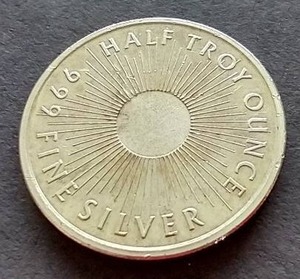 lot 14 image: 12 oz Silver Round