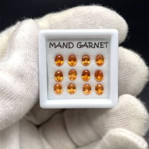 lot 54 image: 3.54 Carats Natural Mandarin Garnet Parcel (Oval Mixed Cuts) Retail $1,416