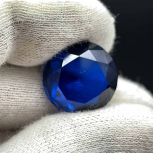 lot 70 image: 16.07 Carats Synthetic Blue Spinel (Round Mixed Cut)