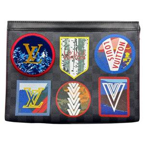 lot 10D image: Louis Vuitton Damier Graphite Pochette Patches Voyage MM Clutch Bag Pre-Owned Retail $1,850
