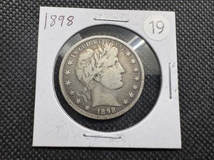 lot 19 image: 1898 Silver Barber Half Dollar - Greysheet Wholesale Value for a XF40 is $165