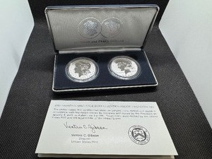 lot 101 image: 2025 Reverse Proof Morgan and Peace Silver Dollars - Two Coin Set - Spectacular Coins