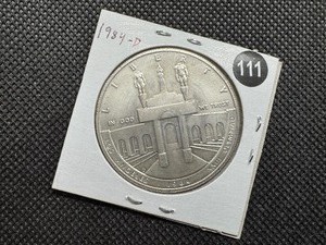 lot 111 image: 1984-D Olympic Commemorative Silver Dollar