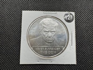 lot 127 image: BU One Ounce .999 Silver Donald J. Trump Never Surrender Round