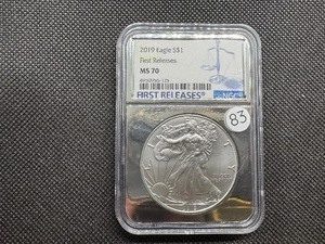 lot 83 image: 2019 First Releases 1  Oz. Silver American Eagle NGC MS70  - Perfect Graded Coin - NGC Price Guide $130