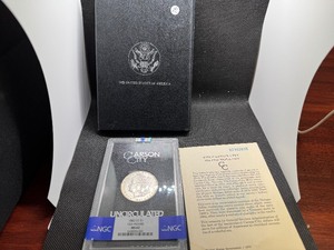 lot 76 image: GSA Uncirculated 1882 Carson City Morgan Dollar NGC MS62 with Original Box and COA