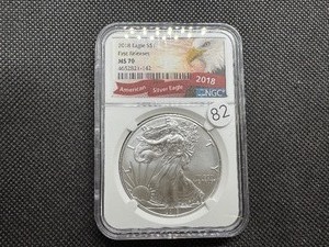 lot 82 image: 2018 First Releases 1  Oz. Silver American Eagle NGC MS70  - Perfect Graded Coin - NGC Price Guide $130