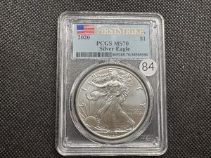 lot 84 image: 2020 1 Oz. First Strike Silver American Eagle PCGS MS70 - Perfect Graded Coin -  PCGS Price Guide $133