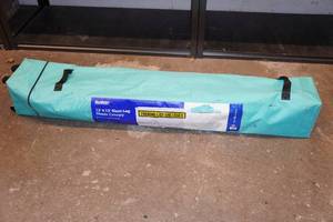 lot 2 image: Academy Sports Outdoors 12x12 Slant Leg Shade Canopy - Teal