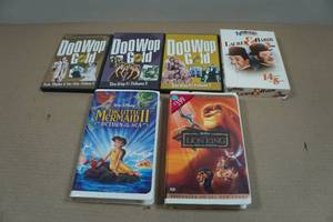 lot 116 image: VHSs & DVDs - Lion King, Little Mermaid II, DooWop Gold