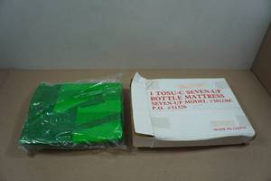 lot 155 image: 7-Up Bottle Pool Mattress Float