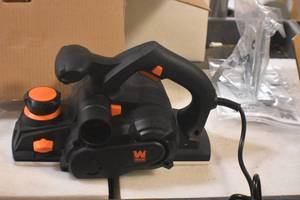 lot 57 image: WEN 6534 8-Amp 4-38-Inch Electric Hand Planer