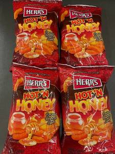 lot 122 image: MIL 3 - Herrs Hot N Honey Cheese Curls - 4 Bags