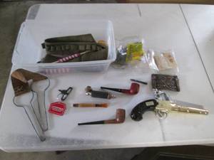 lot 167 image: Vintage tobacco pipes, Avon handgun...