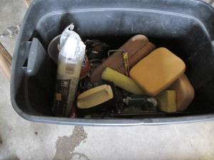 lot 183 image: Storage tote with assorted painting...