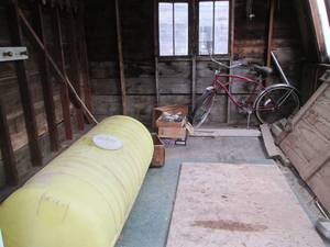 lot 188 image: Contents of shed including a large water tank, vintage bike, antique door knobs and more
