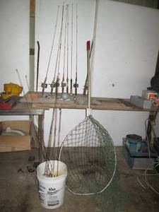 lot 203 image: Assortment of vintage fishing rods,...