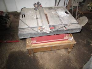 lot 214 image: 15amp 10inch Skilsaw brand portable...