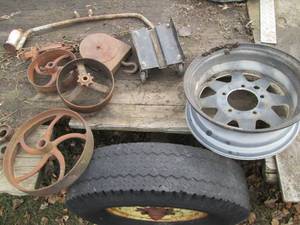 lot 44 image: Vintage cast iron wheels, metal and...