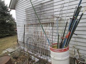 lot 58 image: 55-gallon Drum of sign post, yard m...