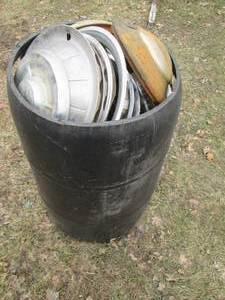lot 66 image: Plastic 55-gallon drum full of vint...
