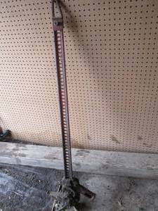 lot 100 image: Antique car jack...