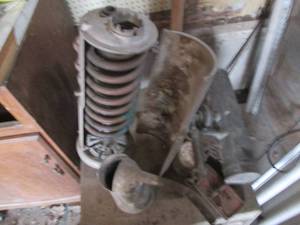 lot 105 image: Antique heaters and oil can...