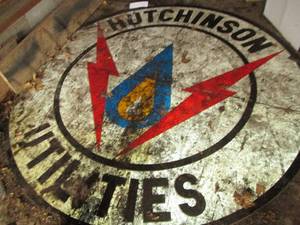 lot 113 image: 8 Hutchinson Utilities wood sign...