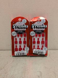 lot 83 image: (2) NEW PRESSIES NAILS