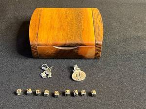 lot 32 image: Koi Fish Pendant & Round Monogram Disc with Alphabet Beads in Wood Box