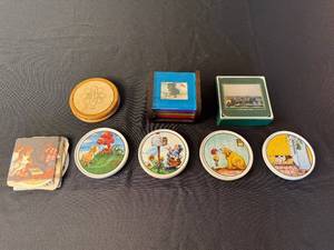 lot 62 image: Vintage Cartoon Coaster Collection with Prague Bridges Box and Atomic Token
