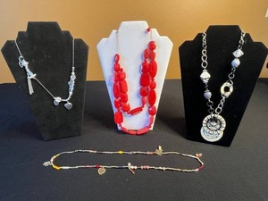 lot 205 image: Red Bead Necklace Set with Treska Sunburst Pendant & Silver Charm Necklaces