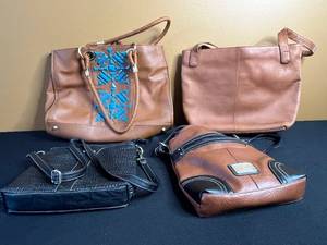 lot 210 image: Stone Mountain Leather Handbags (Lot of 4) - BrownTan & Black