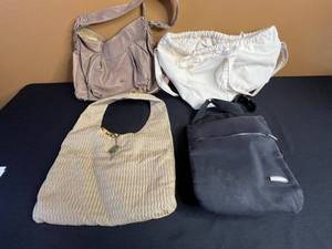 lot 212 image: Travelon Black Crossbody Bag & 3 Purses (Lot of 4)