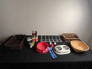 lot 293 image: KONG Red Dog Toy, Dual-Bowl Pet Feeder on Paw-Print Stand & LED Light & Baskets