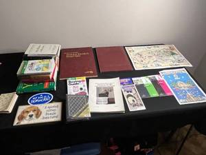 lot 303 image: Misc Lot Inc Rand McNally Business Travelers Road Atlas with Travel Guides, Books, Dog Decor & Ephemera
