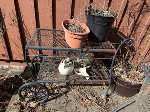 lot 334 image: Metal Plant Cart - Two-Tier with Scrollwork on Wheels for Patio - cart only
