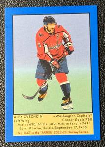 lot 29 image: Alex Ovechkin 2022 Parkhurst Champions Blue Border Mini Washington Capitals Hockey Card No. R-47