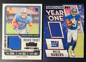 lot 38 image: 2-Card Superstar Rookie Swatch Football Card Lot (Nabers & LaPorta)
