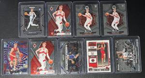 lot 104 image: Gradey Dick 9-Card Toronto Raptors Rookie Basketball Card Lot