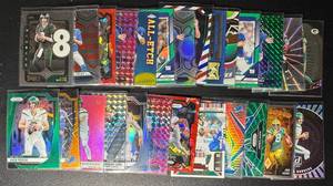 lot 150 image: 26-Card Star QB ParallelInsert Football Card Lot (Rodgers, Love, Goff & more)