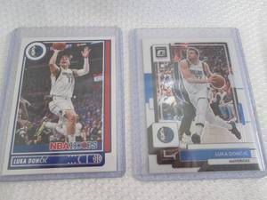 lot 65 image: Hoops & Optic Luka Doncic Cards...